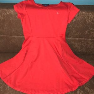 A short sleeve mid length polo dress